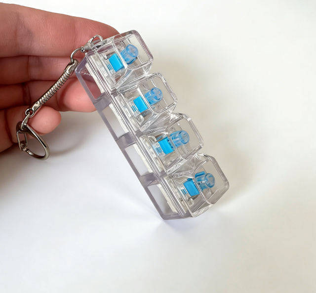 Custom Logo Packing Light-emitting Portable Multifunctional Keyboard Keychain Fidget Light, Finger Press Stress Relief Gadget