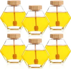 Récipient en verre hexagonal bouteille de stockage avec couvercle en métal bouteille de stockage des aliments pot de miel en verre vente en gros
