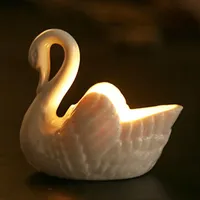Support en porcelaine de cygne coloré de haute qualité pour bougies et accessoires de parfum avec support de boîte à bijoux d'affichage de stockage
