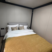 Maison conteneur modulaire préfabriquée pliable à double aile extensible, personnalisée en usine, pour hôtels, bureaux et projets de camps
