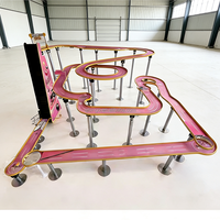 Parcours de billes en marbre rouge personnalisé avec un divertissement intense et une ligue d'obstacles multi-entonnoirs pour les jeux interactifs de divertissement commercial