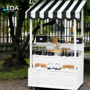 Carrito de Postres Portátil Moderno de Metal LEDA, con Diseño en Relieve Blanco, Toldo a Rayas Blanco y Negro, con Ruedas, Plegable, para Buffet de Dulces, Bodas - Product Image 1