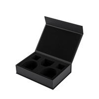 Ensemble de tasses en céramique noire personnalisées en polystyrène, emballées dans des boîtes cadeaux magnétiques avec des matériaux recyclés, finition mate et doublure en éponge