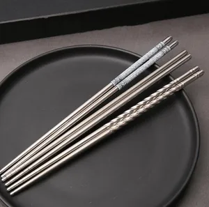再利用可能なステンレス鋼中国の箸白いつるカスタムロゴ金属糸滑り止め箸日本の箸