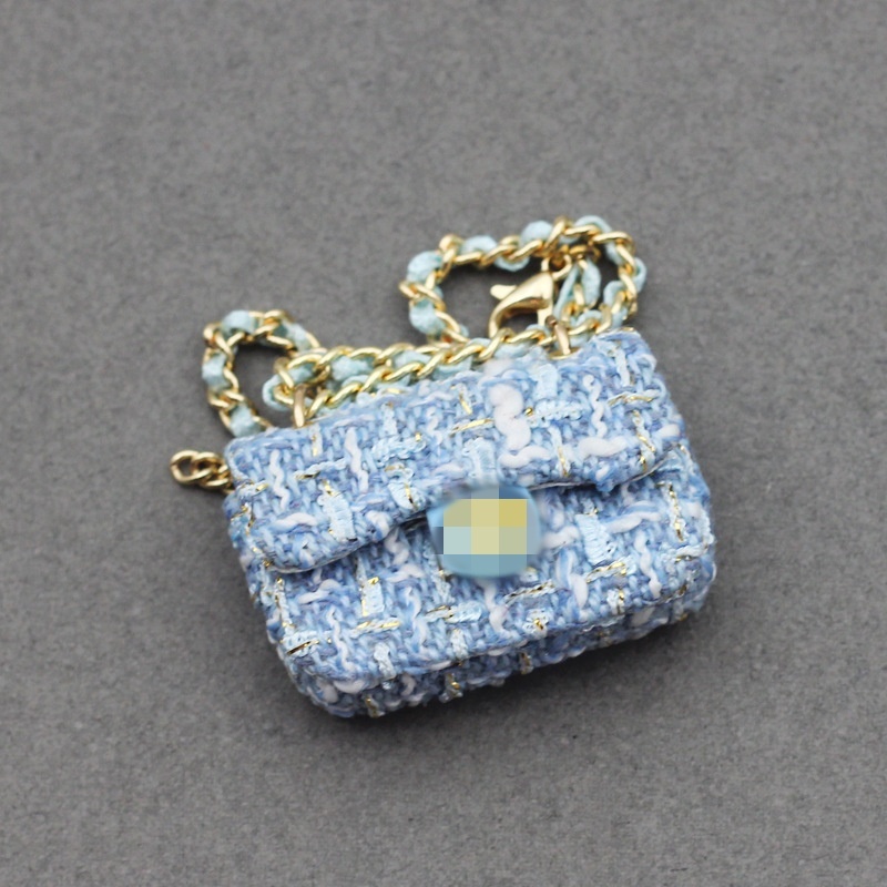 Sac en tissu bleu pour encens, à une épaule.