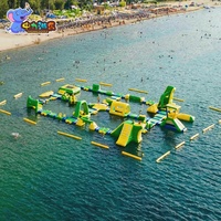 Parc aquatique gonflable géant avec toboggan, trampoline, parc aquatique flottant modulaire, parcours d'obstacles pour lac et mer