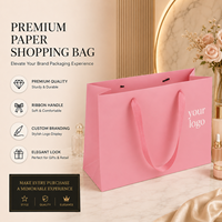 Sacs cadeaux en papier de marque célèbre à prix de gros, emballage en papier d'art pour le shopping, sac en papier personnalisé avec logo