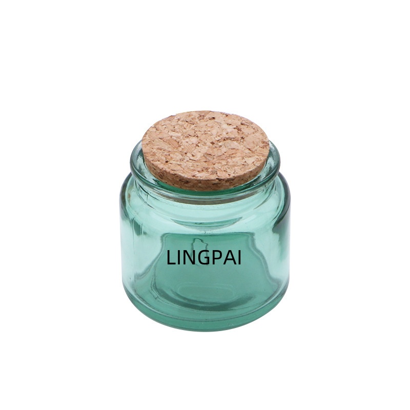 Bocal en verre bleu vert
