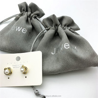 Argent estampage daim cadeau cordon sac bijoux boucle d'oreille sac de rangement Faux daim pochette pour bijoux/montre/lunettes/rasoir