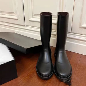 Bottes mi-longues imperméables antidérapantes et chaudes à semelle épaisse, rétro, simples et polyvalentes, bicolores, de marque de luxe CC pour femmes - Product Image 1
