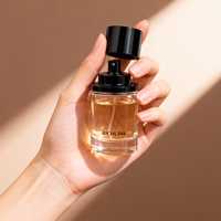 Vente chaude, flacon de parfum de luxe personnalisé en usine, nouveau design, 30 ml, 50 ml, 100 ml, flacon de parfum rond en verre avec bouchon magnétique
