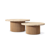Table basse ronde RH MULHOLLAND, en bois massif avec base en piédestal cannelé, design moderne et minimaliste pour salon