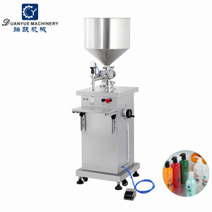 Machine de remplissage verticale haute précision pour bouteilles, pots et canettes, idéale pour sauces, liquides, huiles, pâtes épaisses, miel, huile d'olive et jus. - Product Image 2
