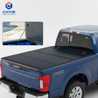 Couverture de benne rigide en aluminium à profil bas, pliable en quatre parties, pour Ford F-250/350 Super Duty 2017-2024, benne de 6'10" (81,9") - Accessoires extérieurs