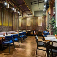 Ensemble de mobilier de luxe pour hôtel et restaurant : banquette en cuir, table à manger en marbre et chaises pour projets commerciaux