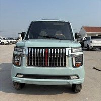Pick-up électrique à quatre roues motrices avec batterie lithium-ion, phares LED, amortissement hydraulique pour le transport de passagers et de marchandises