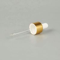 Flacon cosmétique transparent rechargeable avec compte-gouttes et col doré pour l'emballage des soins de la peau