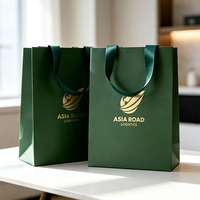 Luxuriöse Einkaufs-Geschenktüte mit individuellem Heißprägung-Goldlogo aus weißem Karton für Unternehmen, Logistik und Großhandel