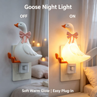 Veilleuse LED murale contemporaine et mignonne en forme de canard blanc avec nœud rose, rotative à 360°, lumière douce et chaude, pour la décoration intérieure des enfants, vente en gros OEM