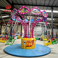Manège à chaises volantes sur le thème des clowns avec lumières LED colorées, équipement d'amusement pour parcs d'attractions et carnavals