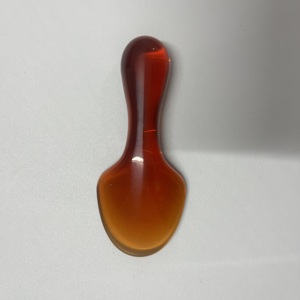 Planche de massage en résine de couleur ambre en forme de pelle - Product Image 5