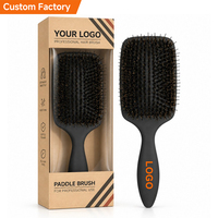 Brosse à perruque avec poils de sanglier et de nylon, design grand format en forme de pagaie et coussin en caoutchouc pour l'entretien des postiches, vente en gros
