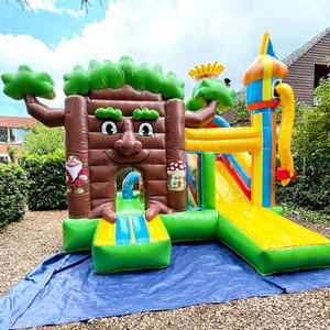 Castillo inflable comercial con tobogán, diseño de bosque de hadas. - Product Image 1