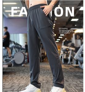 กางเกงวิ่งผู้ชายแบบแห้งเร็วมีกระเป๋าแฟชั่น - Product Image 1