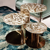 Meja Kopi Bulat Modern Elegan dengan Permukaan Marmer dan Set Furnitur Ruang Tamu Mewah dari Baja Tahan Karat untuk Penggunaan di Rumah