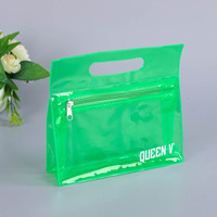 Vente en gros Trousse de toilette cosmétique en PVC coloré Orange clair de voyage avec poignée Trousse de maquillage en PVC avec fermeture éclair