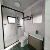 Conteneur portable au design moderne de 20 pieds 40 pieds personnalisé abrite des toilettes Panneau sandwich durable et écologique Salle de bains Événements publics