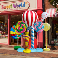 Sculpture de sucette tourbillonnante arc-en-ciel écologique pour la présentation de nourriture de fête d'enfants, décoration de salle de desserts en résine brillante