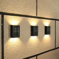 Außenhof-Dek Garage Gehweg Veranda wasserdicht auf und ab 3000K-Batterie IP65 Bewegungssensor Solar-Wandlampe-Beleuchtung