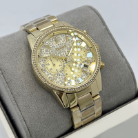 Montre chronographe de luxe pour femmes MKOriginals en acier inoxydable doré, avec lunette pavée de cristaux, aiguilles, étanche, fermoir pliant