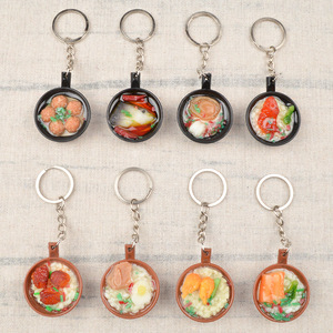 Modelo de juguete de comida en miniatura de arroz en olla de barro simulado (estilo cantonés), colgante de llavero con forma de snack sabroso - Product Image 1