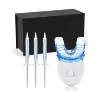 Oferta de Fábrica al por Mayor: Kit de Blanqueamiento Dental de Lujo en Caja OEM para Uso Doméstico, Tratamiento de 30 Minutos, Gel sin Peróxido de 3ml*3, 5 Bombillas LED, Plástico