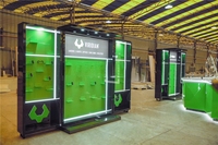 Présentoir de magasin d'exposition personnalisé, support en bois pour vitrine d'armes, meubles de salon professionnel, présentoir pop-up Solutions de décoration