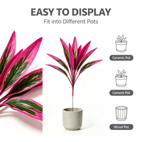 Vente en gros usine : Dracaena artificielle en plastique 58 cm, feuilles effet film rose et vert, tige en fer, pour décoration intérieure et événements (sans pot)
