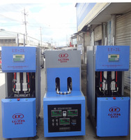Machine de soufflage automatique d'alimentation de préforme manuelle