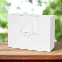 Sacs en papier blancs de luxe personnalisés avec logo imprimé pour la vente en gros, sacs cadeaux pour boutiques de détail avec votre propre logo