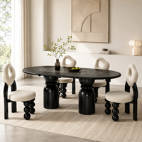 Ensemble de table à manger noire post-moderne de luxe, table ovale sur piétement sculptural, 4 chaises rembourrées pour hôtel, villa, projet