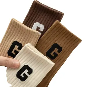 Custom Logo High Quality Winter Crew Jacquard New Letter Cute Breathable Athletic Socks Women Striped Sports Socks