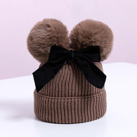 Vente en gros de bonnets d'hiver chauds pour bébés et enfants, bonnets en tricot doublés de coton, nœud papillon, double pompon
