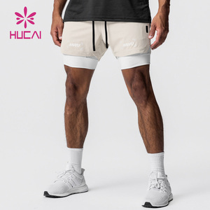 HUCAI OEM Lined Double Layer Pockets Athletic Sports <strong>Nylon</strong> Custom logo 5 Inch Workout <strong>Training</strong> 2 in 1 Mens Gym Shorts for Men - Product Image 5