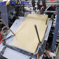 Machine automatique multifonctionnelle pour l'emballage de petits articles en papier et la fabrication d'enveloppes