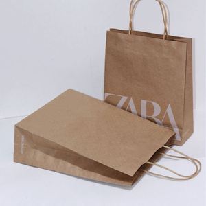 Single Color Name logo Printing Small Quantity Cheap Natual Color Bag 120gsm Kraft Paper Gift Bags Custom - Product Image 2