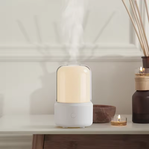 Mini difusor portátil de aceite esencial a la luz de las velas, Humidificador silencioso para cabecera de dormitorio, atomizador de esterilización purificador de aire - Product Image 5