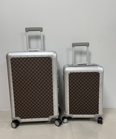 Valise à roulettes en aluminium à motif damier populaire 2026, grande capacité, étanche, avec serrure TSA, idéale pour les professionnels