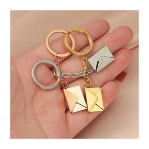 Nouveaux styles de porte-clés en acier inoxydable en forme d'enveloppe de lettre d'amour, cadeau de confession pour la Saint-Valentin, pendentif personnalisé au laser, porte-clés en métal - Product Image 1