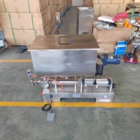 Machine de remplissage pneumatique semi-automatique à double tête pour boissons, huiles et matériaux à grosses particules, compatible avec les sachets/sacs